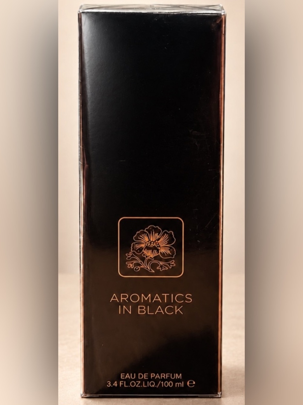 Clinique Aromatics In Black - Black Packaging with Gold Accents
